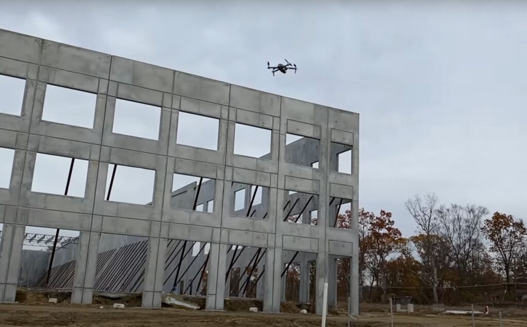 Drone over high walls